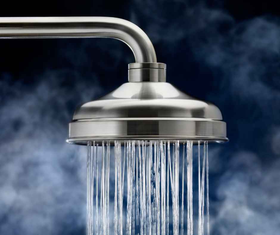 A shower head running water